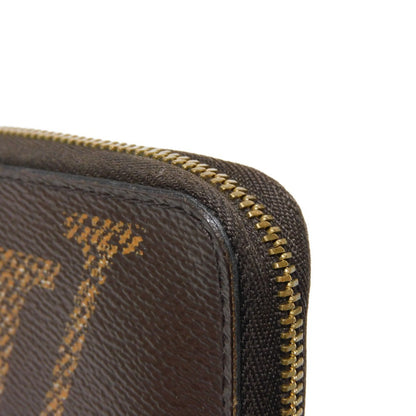 LOUIS VUITTON Coin case M69354 Monogram giant canvas x grained leather (embossed) Marron x Noir Monogram Giant Zip around purse