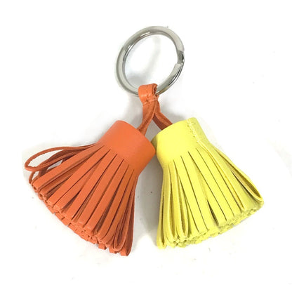 HERMES key ring Anyo Miro Orange x yellow fringe Carmen Unodos