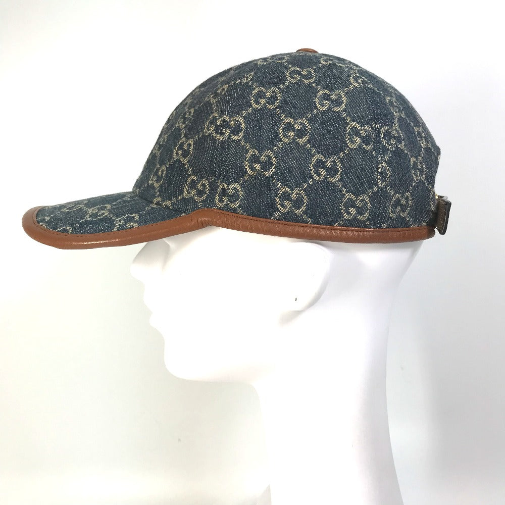 Gucci cap shops on head