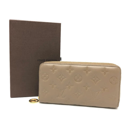 LOUIS VUITTON Long Wallet Purse M81511 leather Beige type Monogram emboss Zippy wallet Women Used Authentic